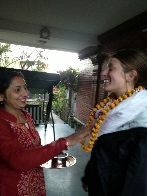 In line with Nepali tradition, my Aama (mother) gave me a garland of marigolds and fed me three spoonfuls of curd as I departed their home on my last day. 