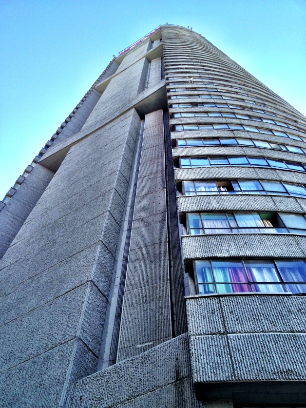 Ponte City in Hillbrow. This building is an example of how one of the rougher areas is being improved. At one time, this building was hijacked by gangs. Now, it's cleaned up and becoming re-inhabited by legitimate renters, with a large community center in the bottom.